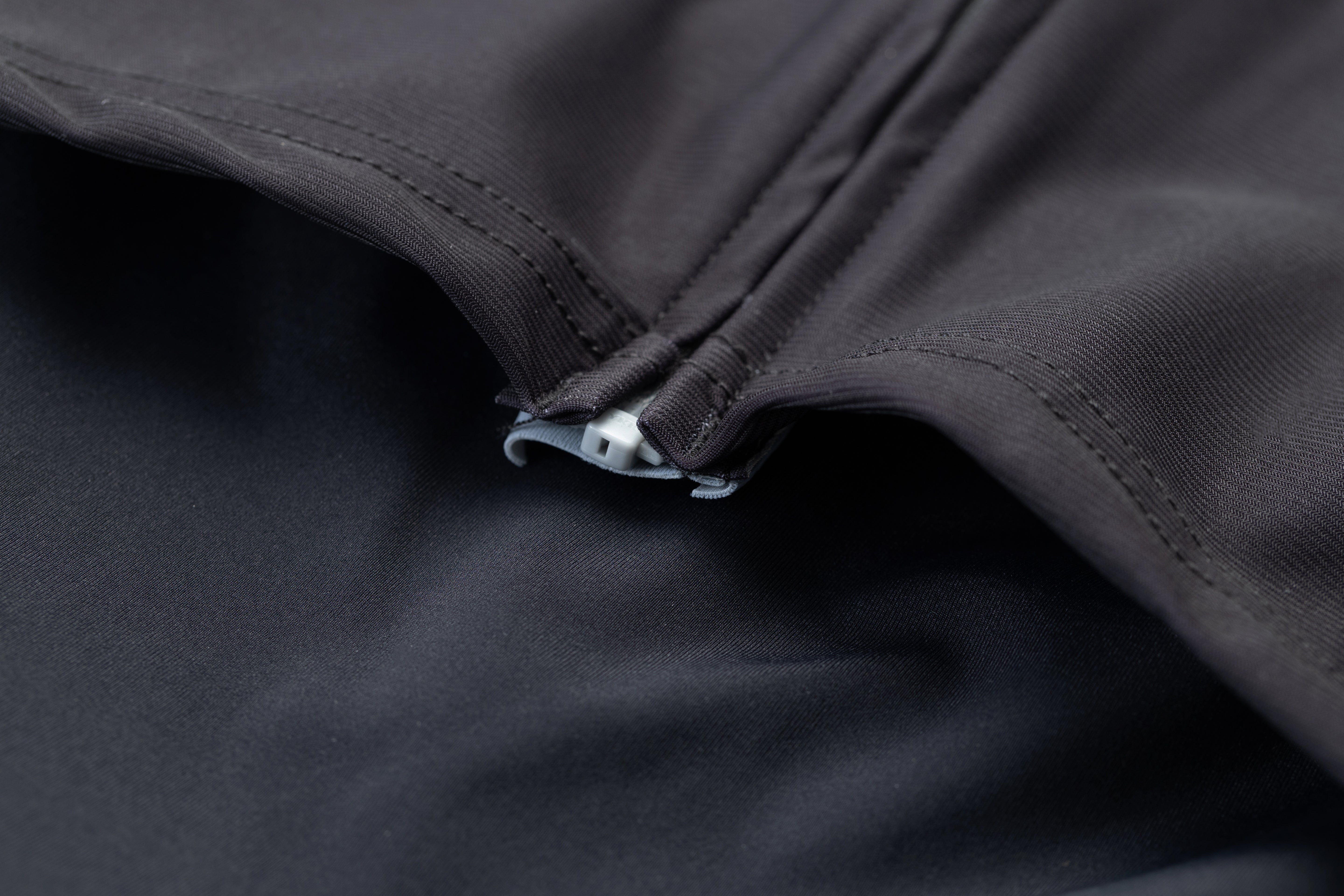 Close-up of seam alignment near zipper area of TSR suit
