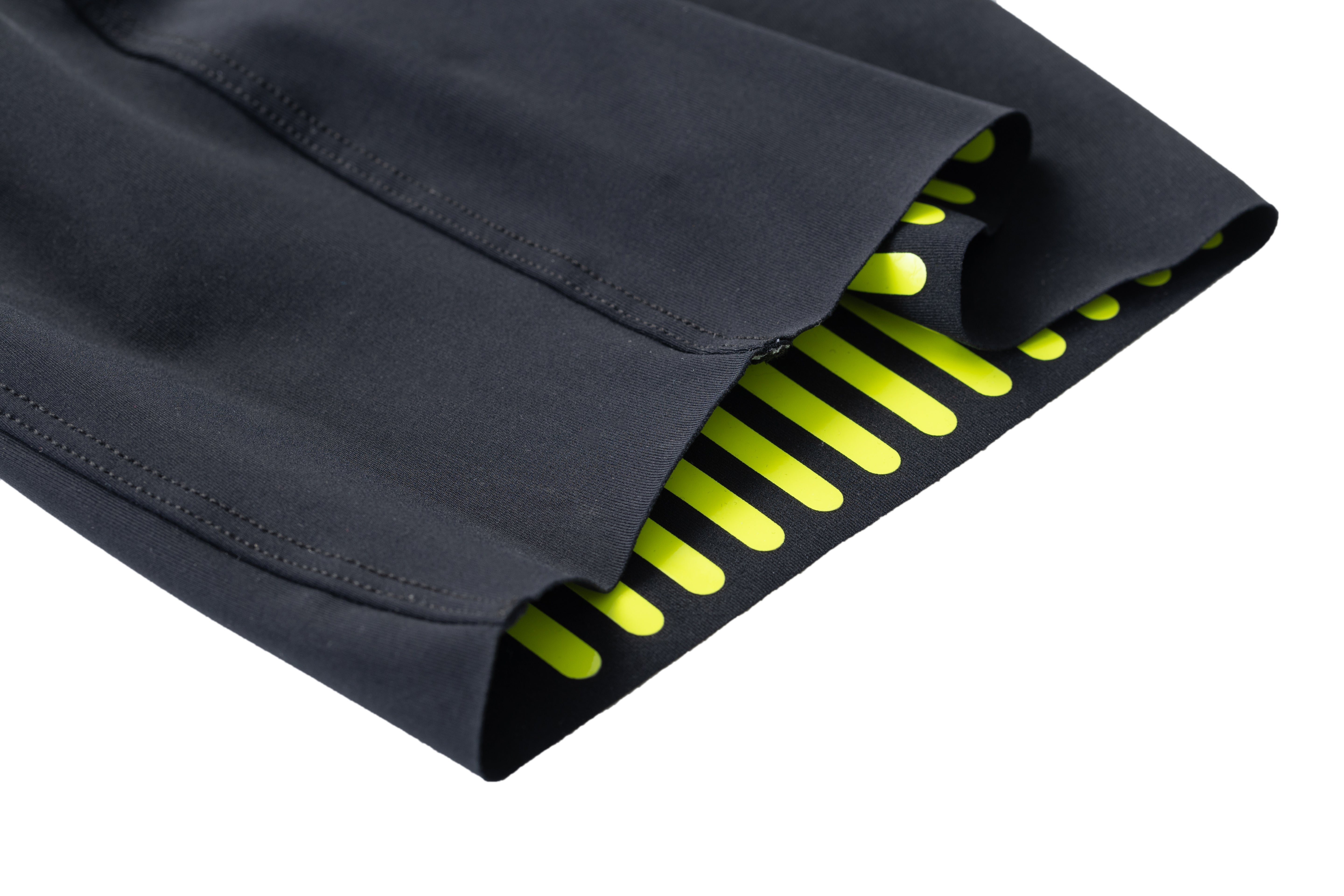 Elastic leg band with gripper dots at the hem of TSR race suit