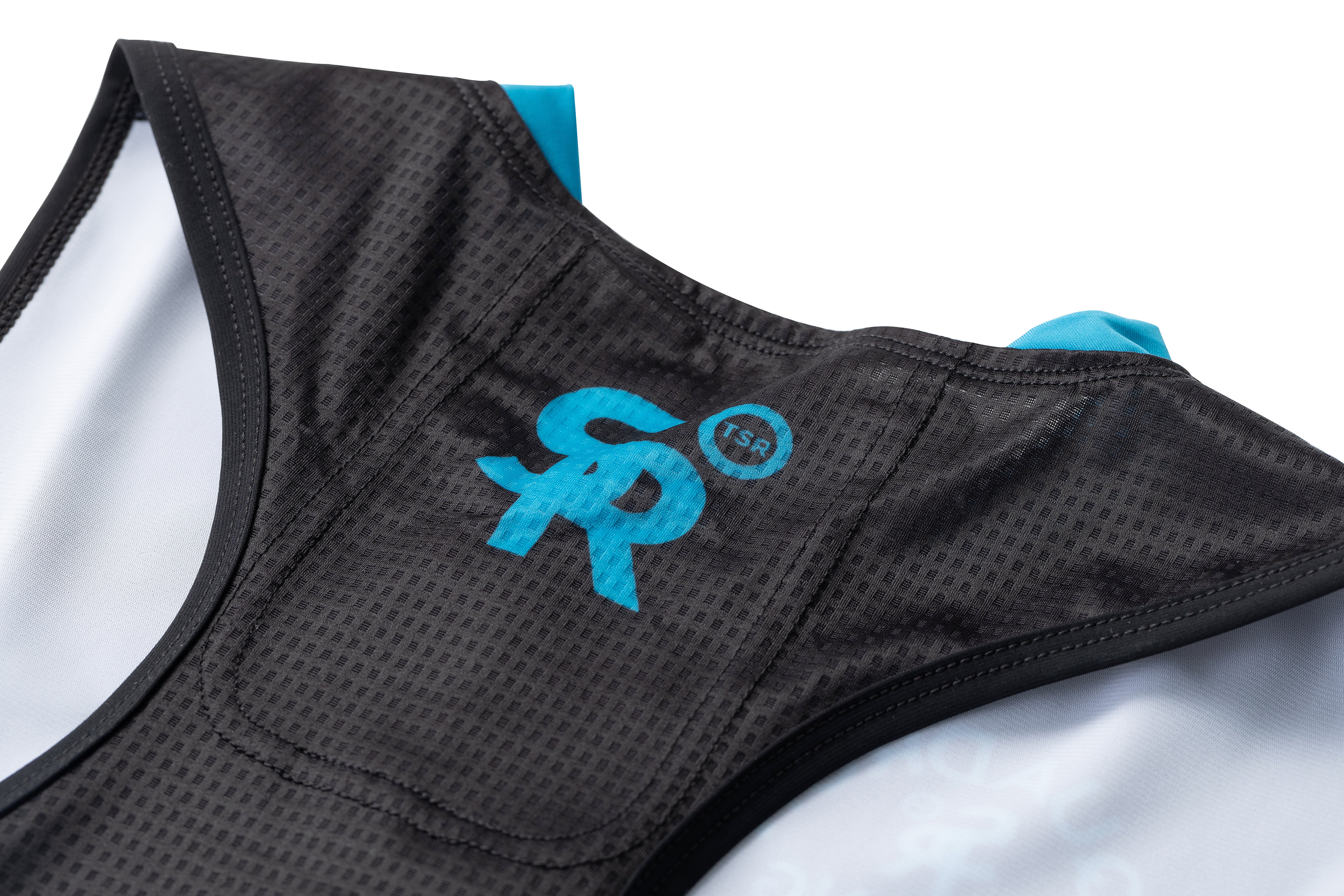 TSR logo detail on back mesh panel of women's race suit