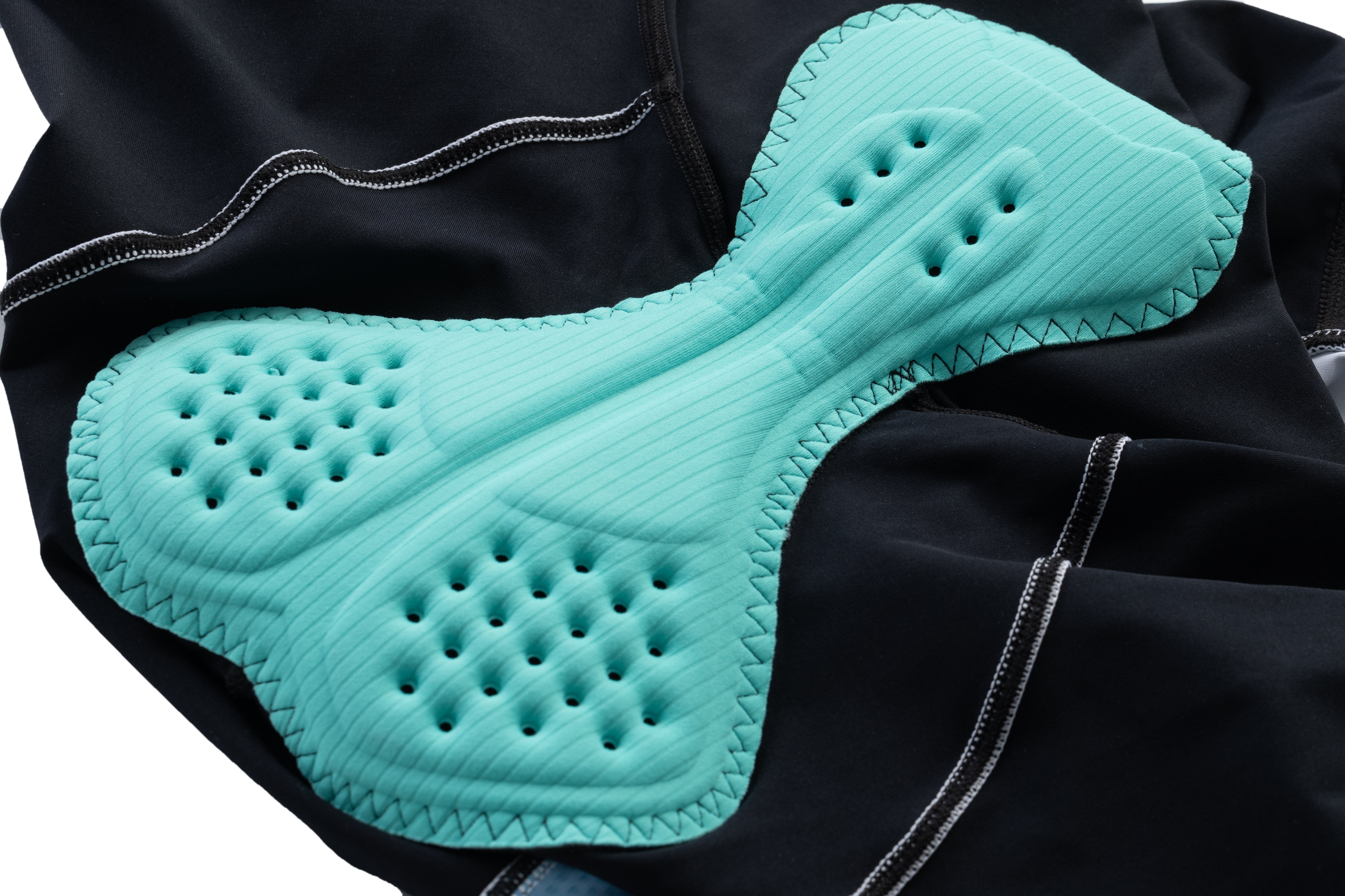 Internal mint-colored chamois pad designed for triathlon comfort