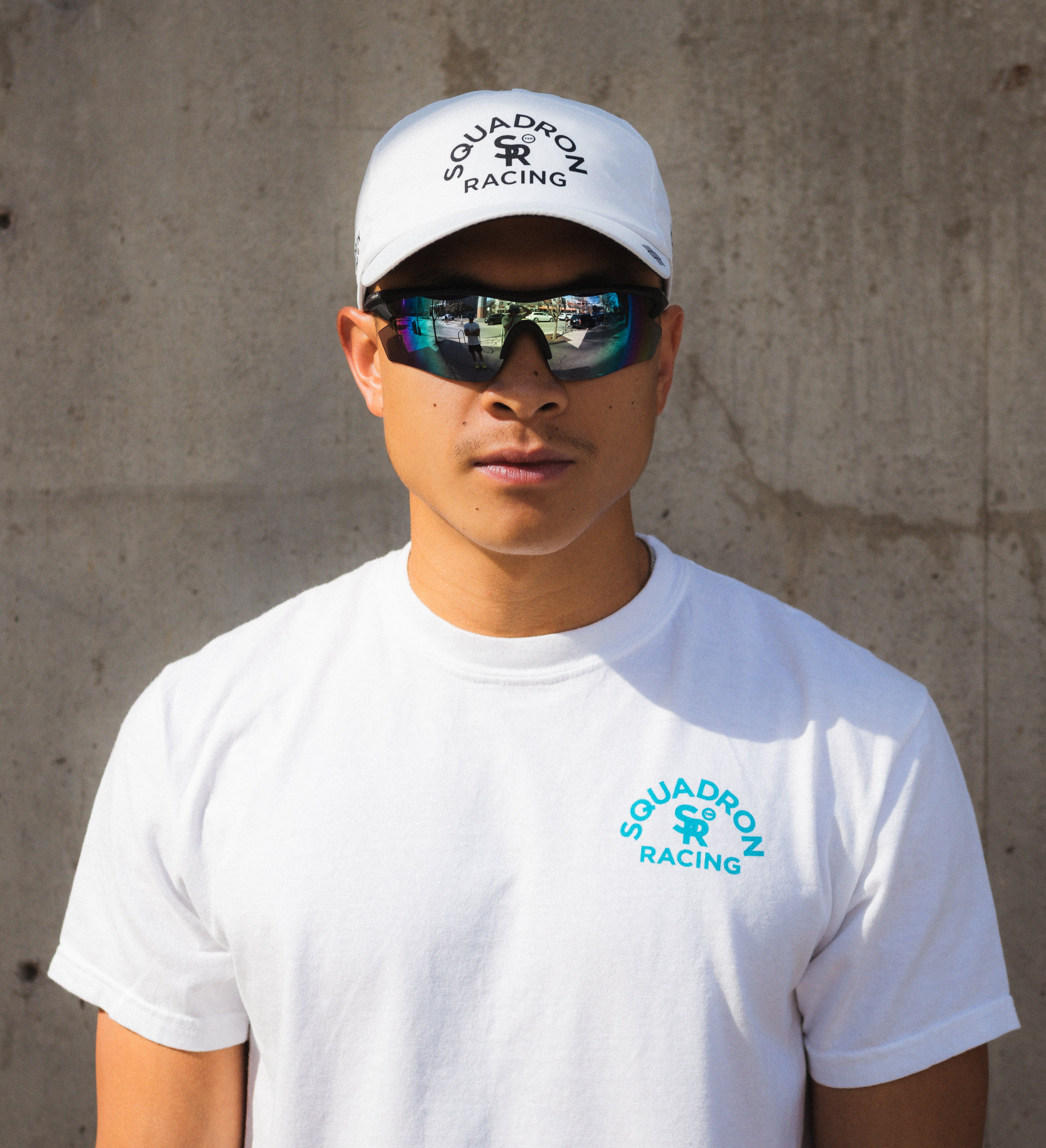 Athlete wearing the white squadron racing hat.