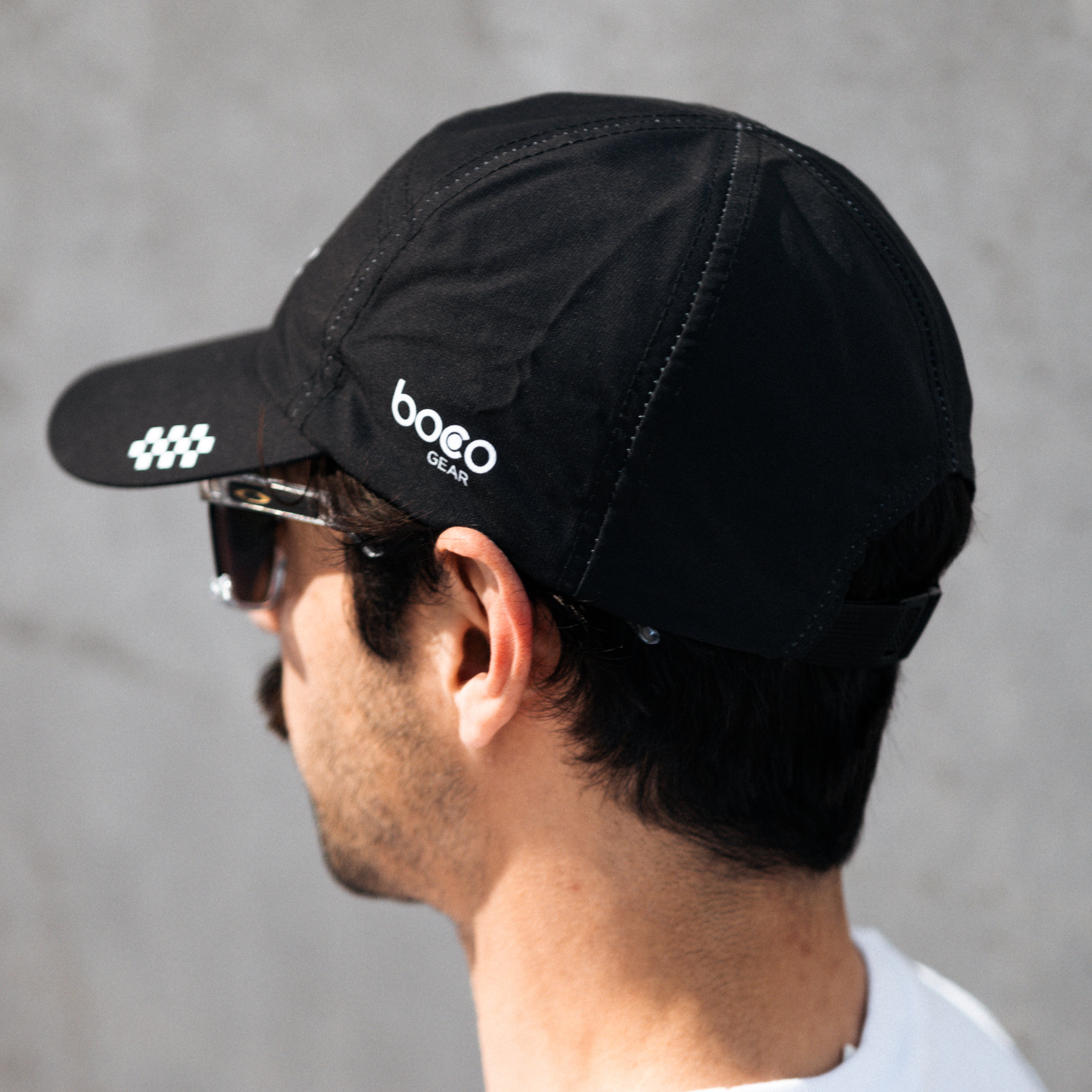 Squadron racing athlete wearing the new black race hat. 