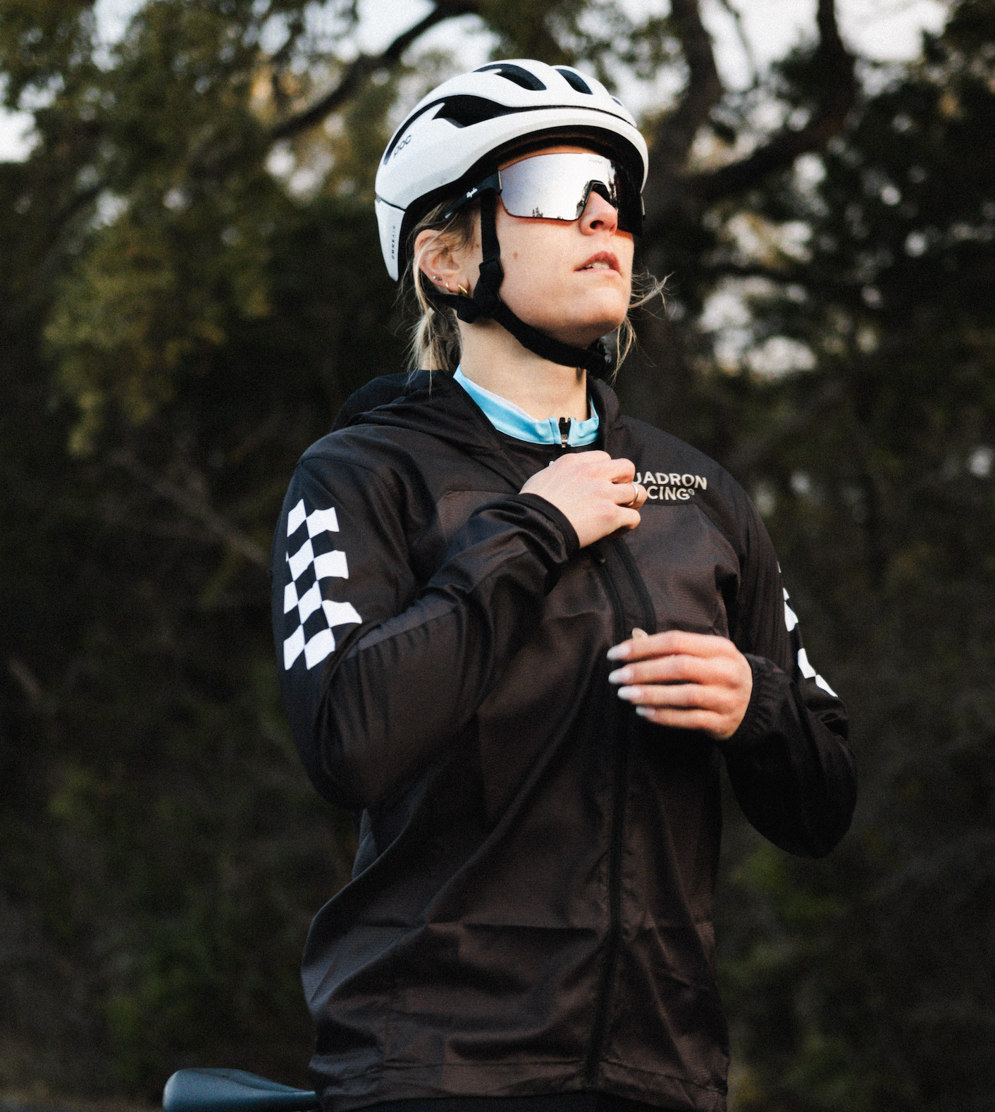 Becca wearing a Squadron Racing Wind jacket.
