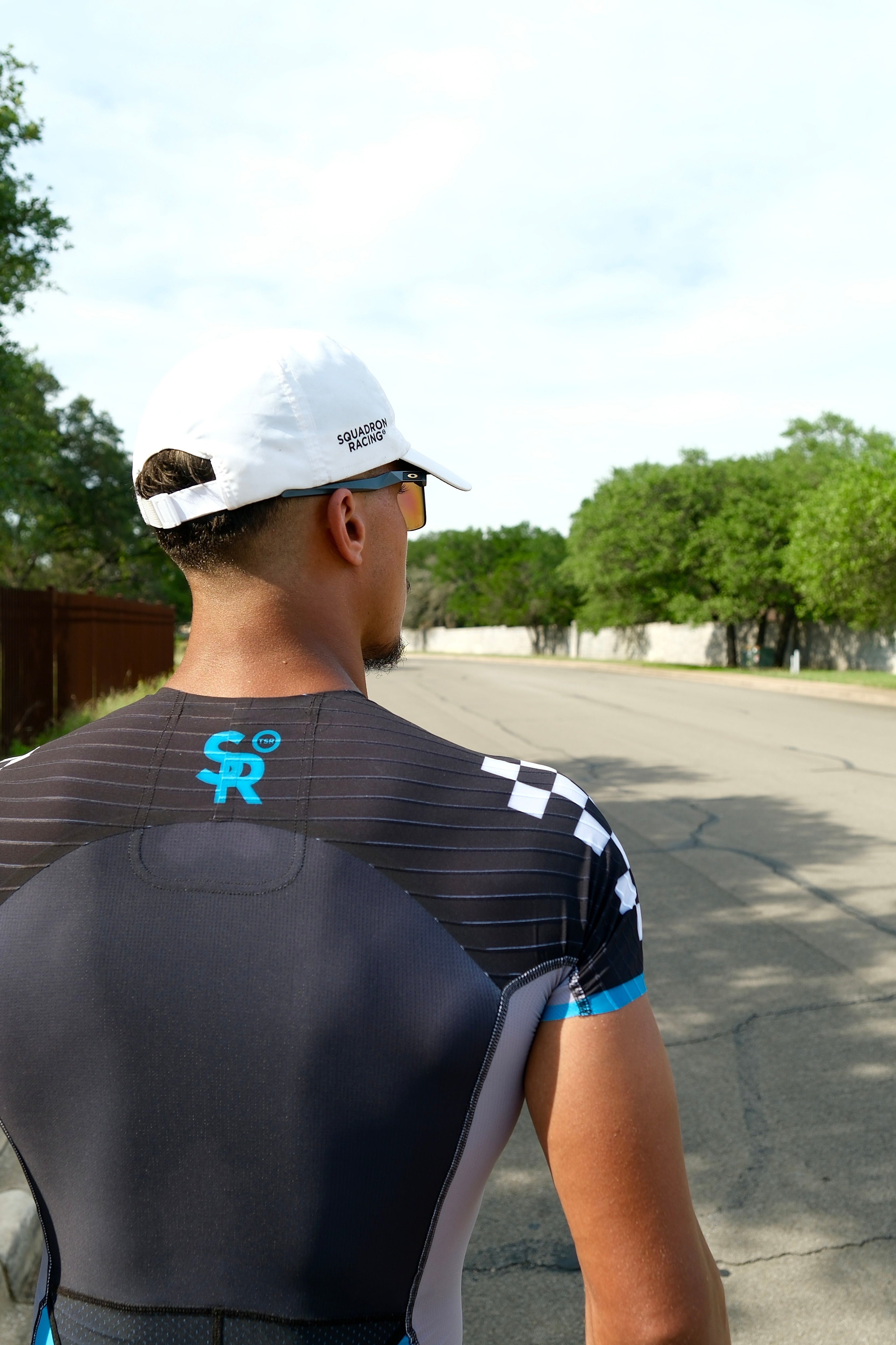 Close up of the back panel of the squadron racing triathlon suit on an athlete.