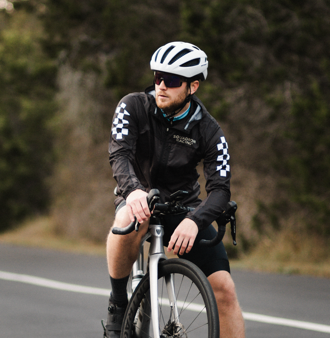 Ian wearing a Squadron Racing wind jacket during cold weather training.