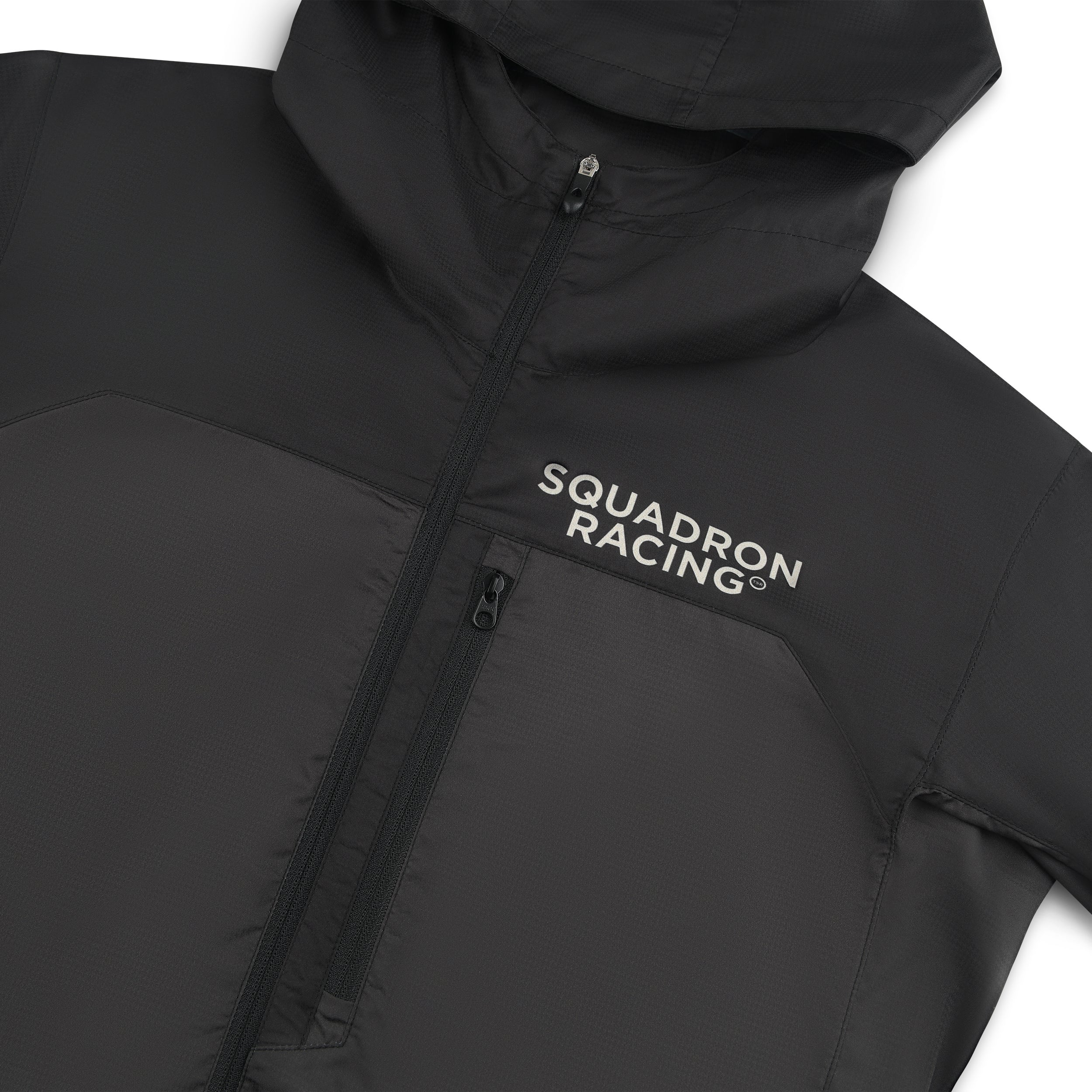 Zipper detail and Squadron Racing chest logo on women's windbreaker jacket