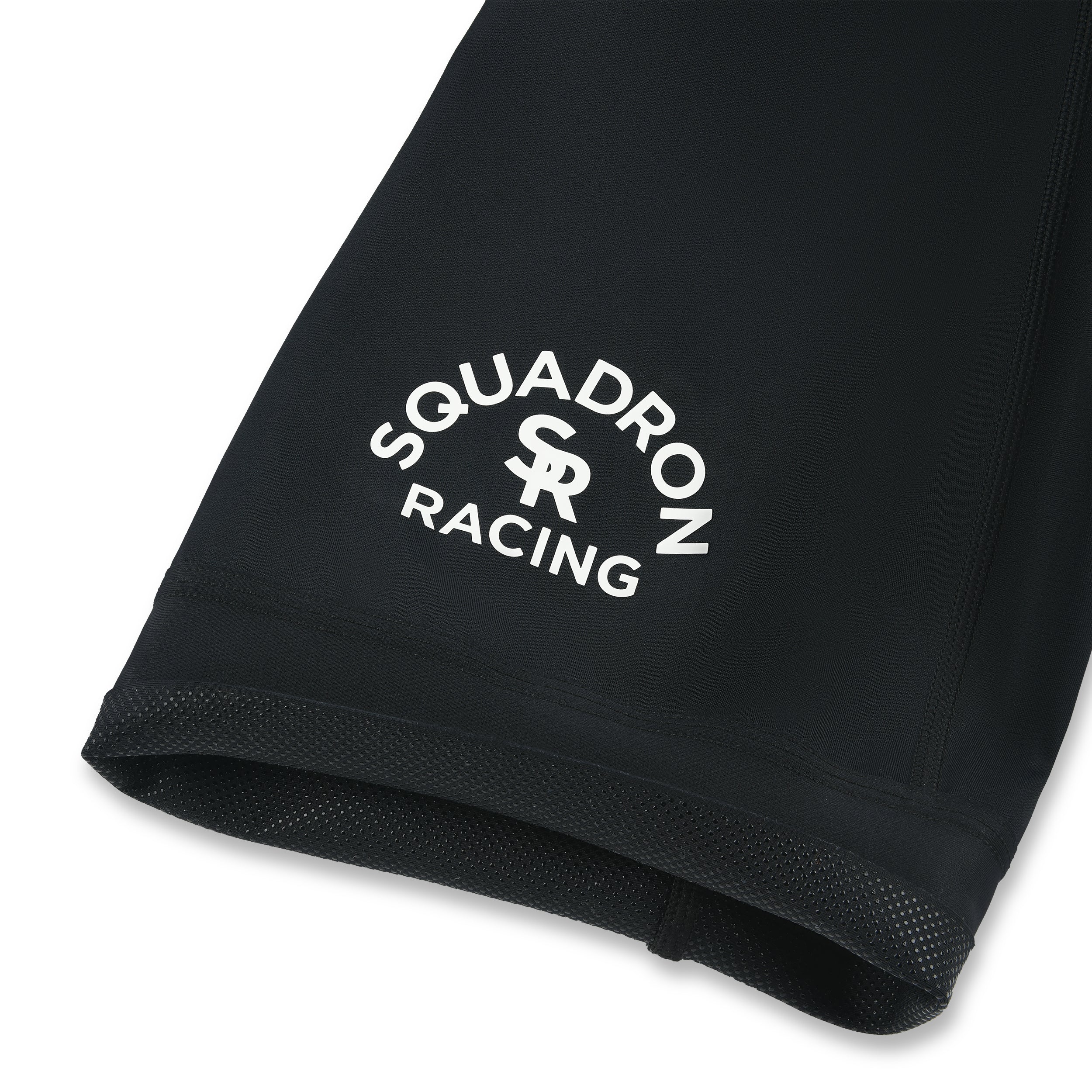 Close-up of Squadron Racing logo printed on the leg cuff.

